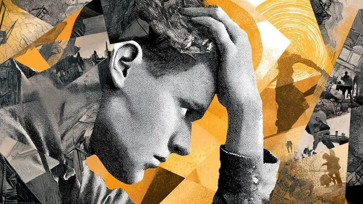 Young man with hand on forehead.